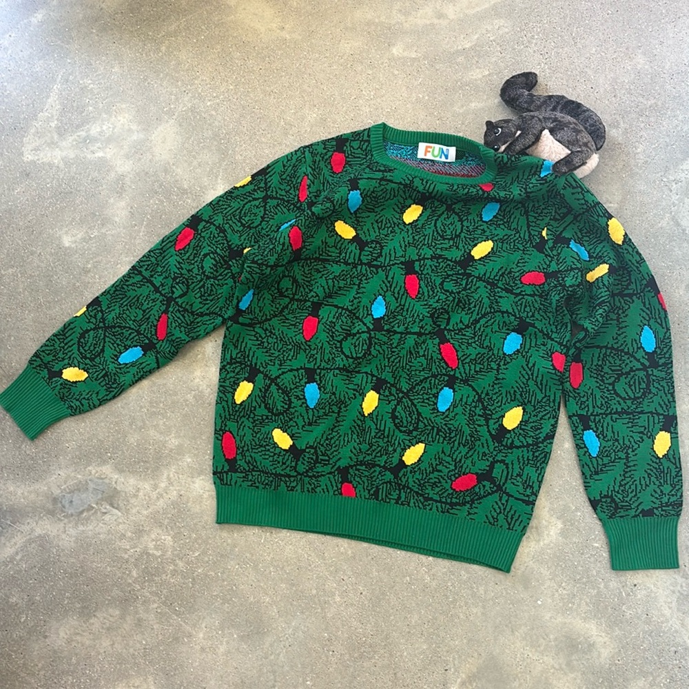Nice sweater for Christmas time with a nice buddy on your shoulder